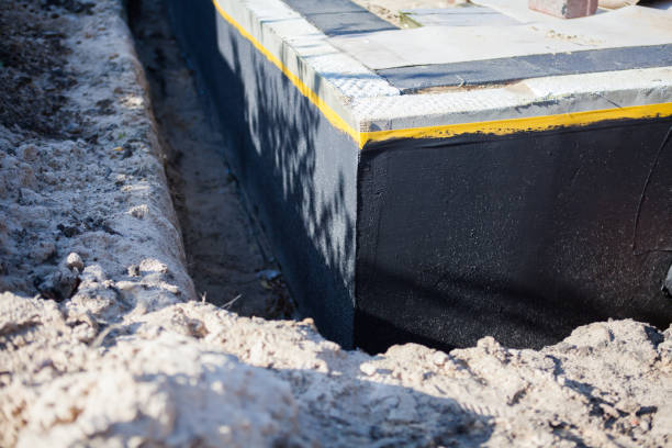 Professional Waterproofing technician working in Hydes, MD